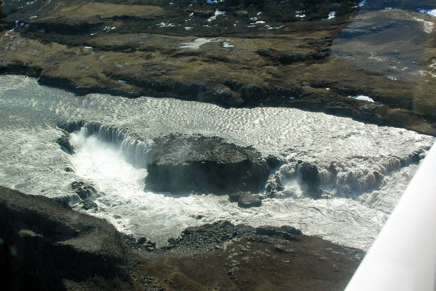 Aerial view of low waterfall on Jökulsá á Fjöllum at Hólmatungur