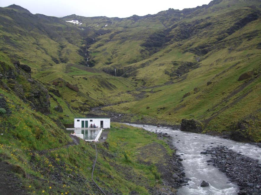 Seljavallalaug pool in the Laugará valley at the foot of Lambafellsheiði