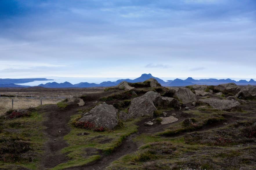 Lava rocks in the foreground with the Jarlhettur peaks and the southern edge of Langjökull above the Hagavatn basin