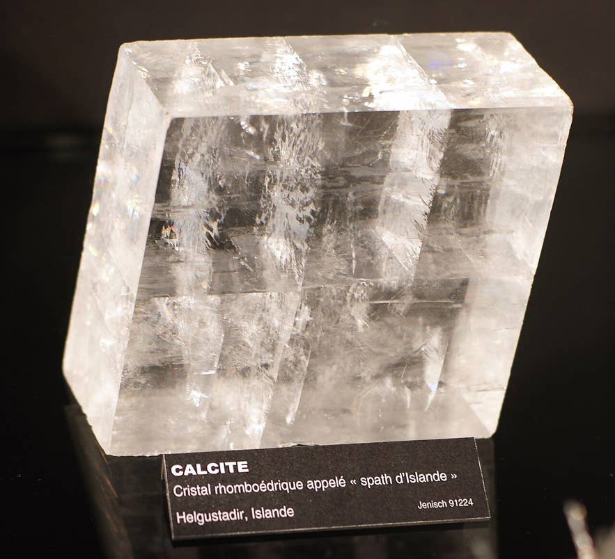 Clear Iceland spar calcite crystal from Helgustaðir on museum display