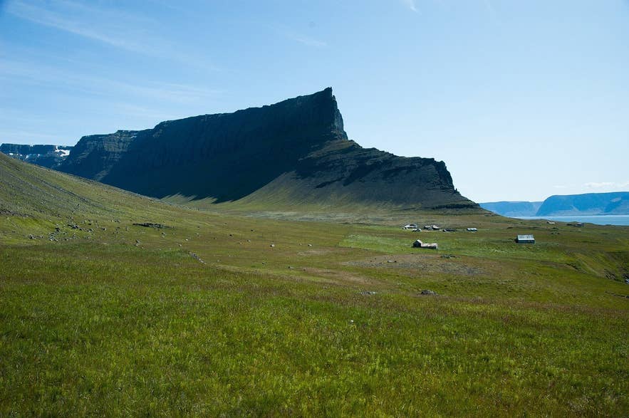 Lokinhamradalur valley between steep mountains and the sea on Arnarfjörður, Westfjords