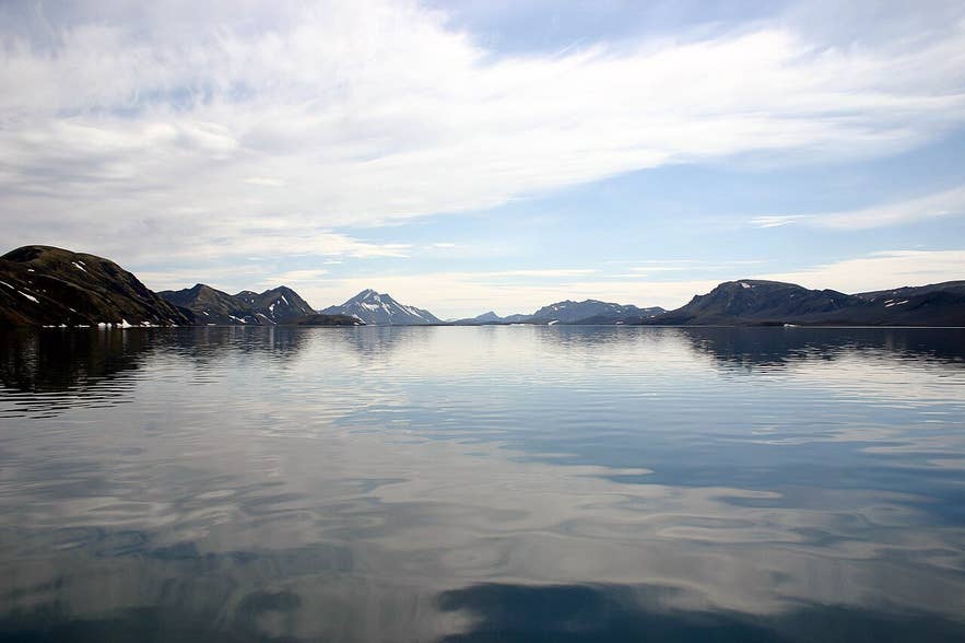 Langisjór lake with the surrounding hyaloclastite ridges including Tungnaárfjöll reflected in calm water Langisjór lake with the surrounding hyaloclastite ridges including Tungnaárfjöll reflected in calm water