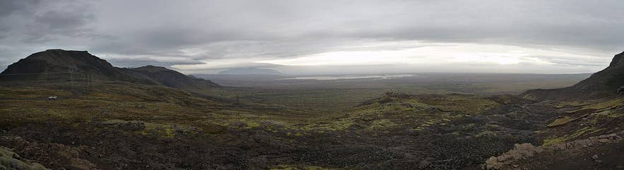 Panorama of moss-covered lava and the power line near F338 at Mosaskarð Pass Panorama of moss-covered lava and the power line near F338 at Mosaskarð Pass