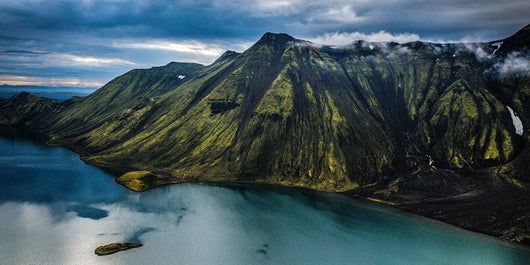 On day one, you'll start the trek at Lake Langisjor to the summit of Sveinstindur.