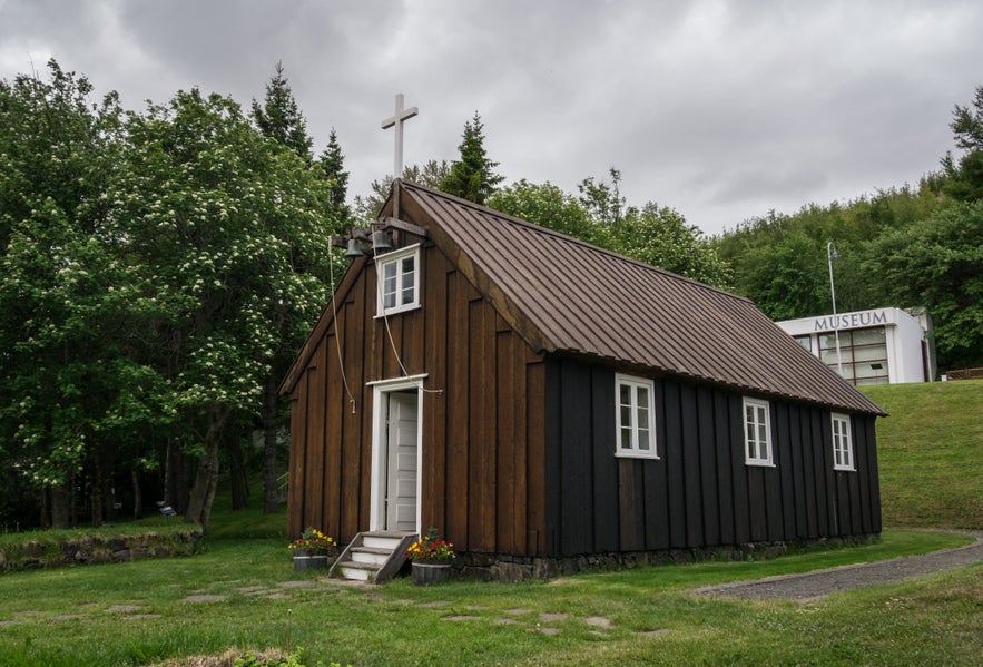 The Akureyri Museum church is located in a lush garden.