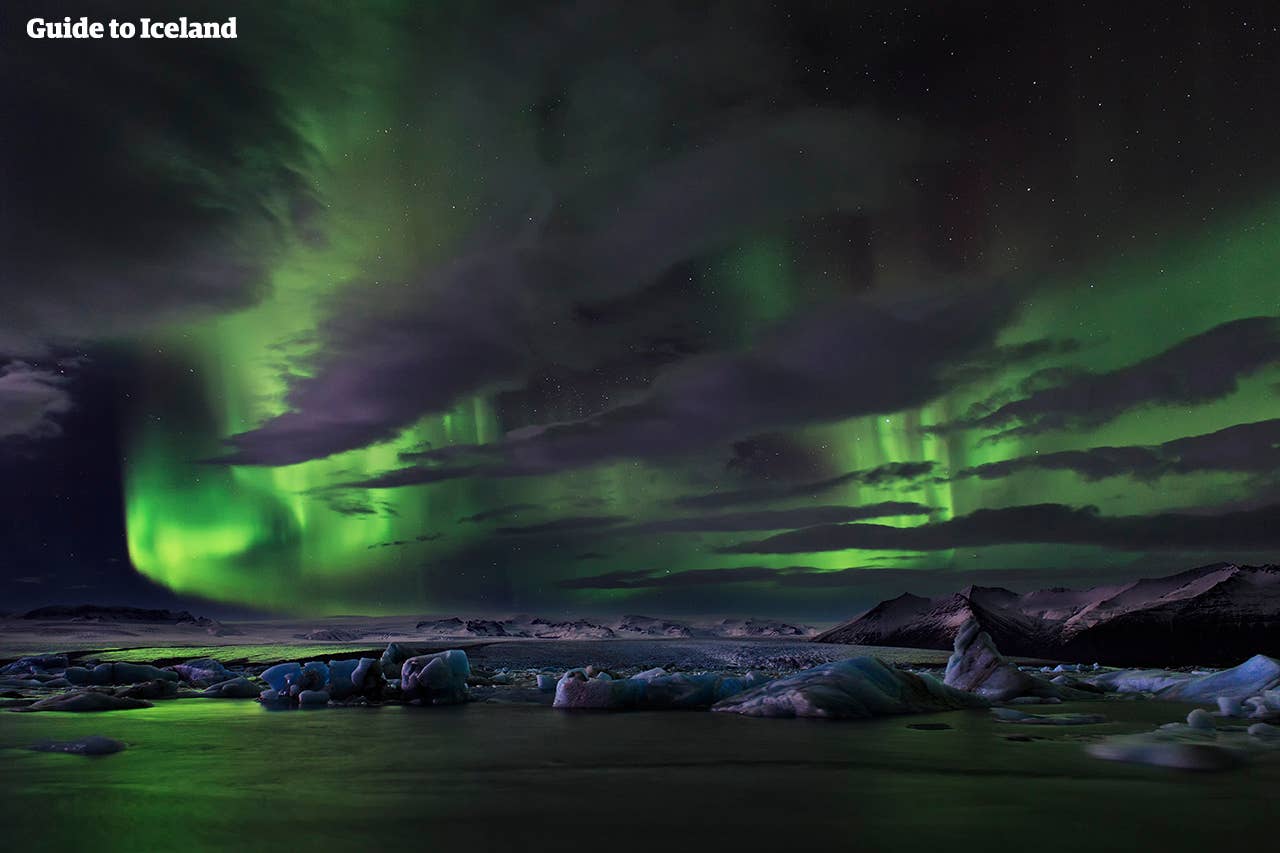 Dramatic Northern Lights over Jökulsárlón glacier lagoon in southeast Iceland