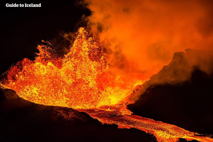 Active lava flow at an Iceland volcano eruption showing why Iceland is worth visiting for dramatic natural wonders.