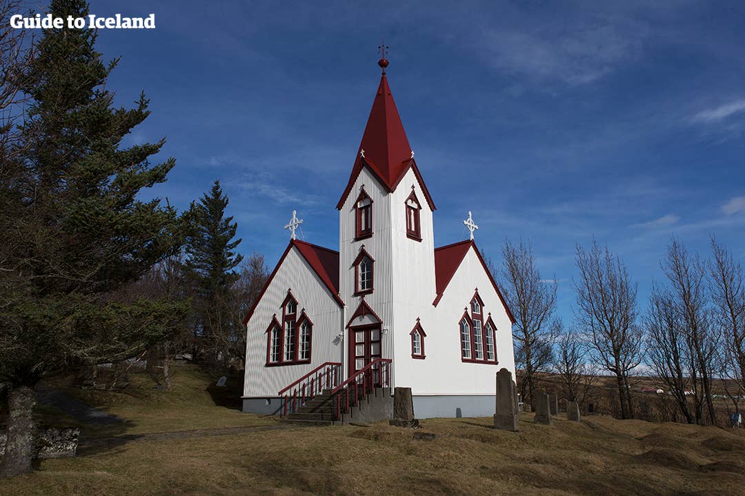Many churches in Iceland are white with red roofs