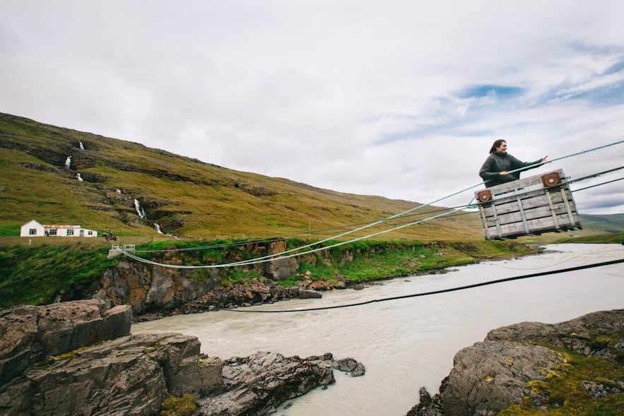 Cross a powerful glacial river in Iceland with a cable cart!