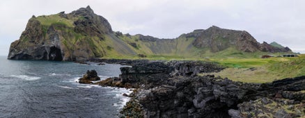 The Herjolfsdalur valley is surrounded by beautiful rock formations