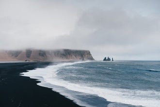 The South Coast region is famous for its long stretches of black sand beaches.