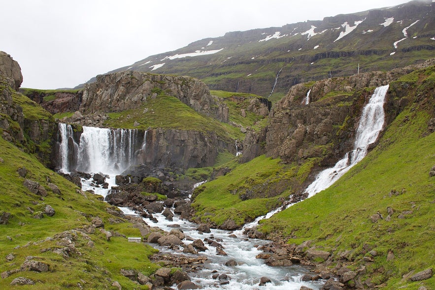 Vestdalsfossar features breathtaking views of cascading waterfalls against rugged cliffs and lush landscapes along the Vestdalsa River.