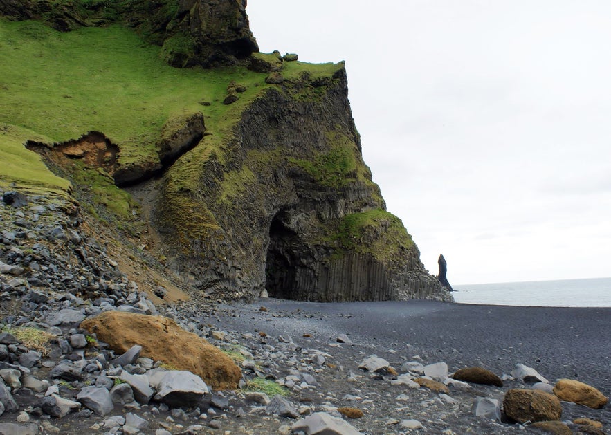 Halsanefshellir Cave is a sea cave featuring octagonal basalt pillars located on Reynisfjara Black Sand Beach in the town of Vik in Iceland.