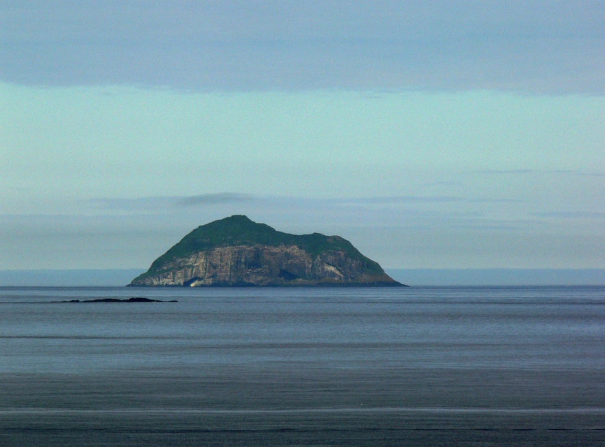 Skrudur island rises beautifully off the coast of East Iceland. Skrudur island rises beautifully off the coast of East Iceland.