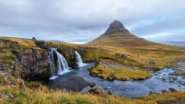 Kirkjufell mountain is one of Iceland's photography hotspots, with its cone-shaped peak and picturesque foreground waterfall.