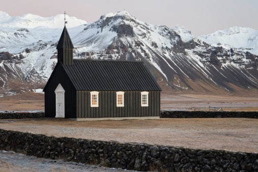 Budir church looks striking with its black exterior contrasting beautifully against the natural surrounding landscape.