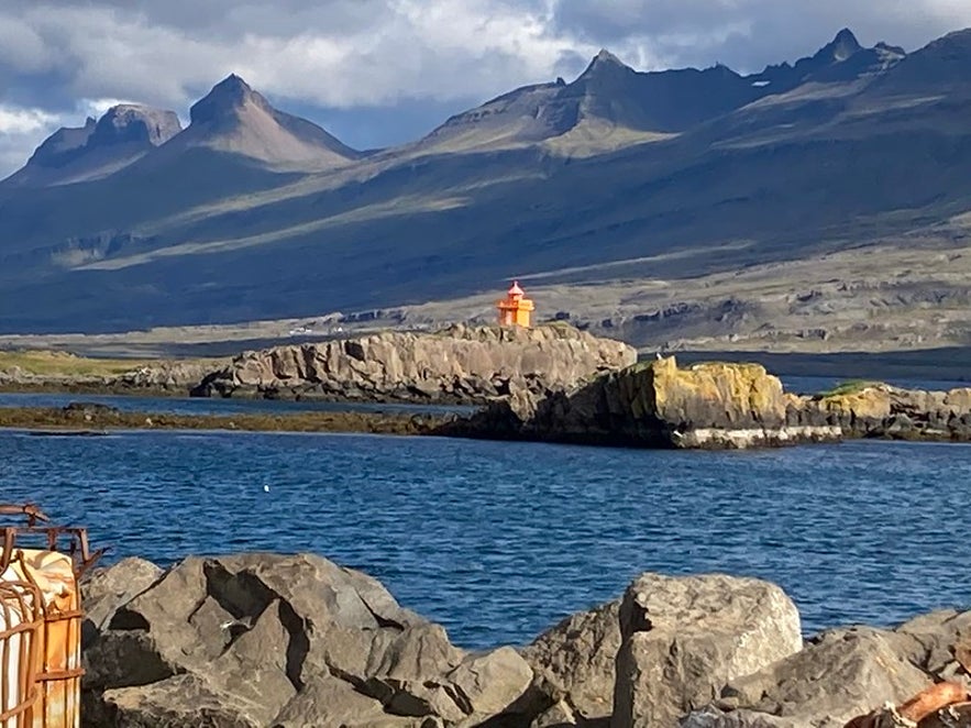 The Djupivogur Lighthouse has a vivid orange coloration.