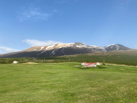 The Litla-Sandfell Guesthouse is located within a peaceful valley