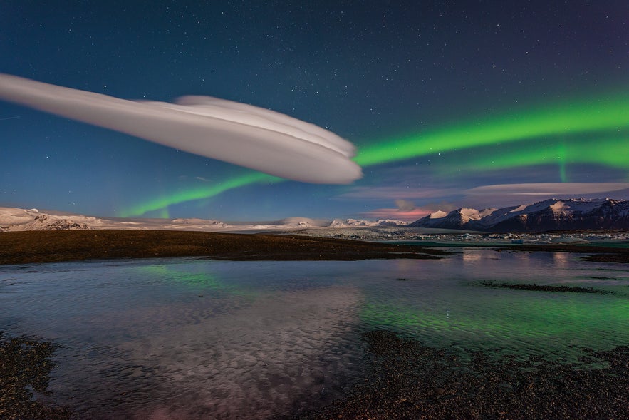 Northern Lights over Jökulsárlón glacier lagoon, found along the South Coast of Iceland.