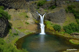 Gjarfoss is a beautiful waterfall in a stunning valley amid the remote South Iceland countryside.