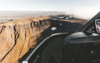 Enjoy magnificent views from the helicopter during your 3.5-hour tour over famous filming locations.