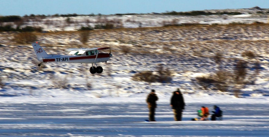 #Airplanes landing on frozen lake in Iceland 