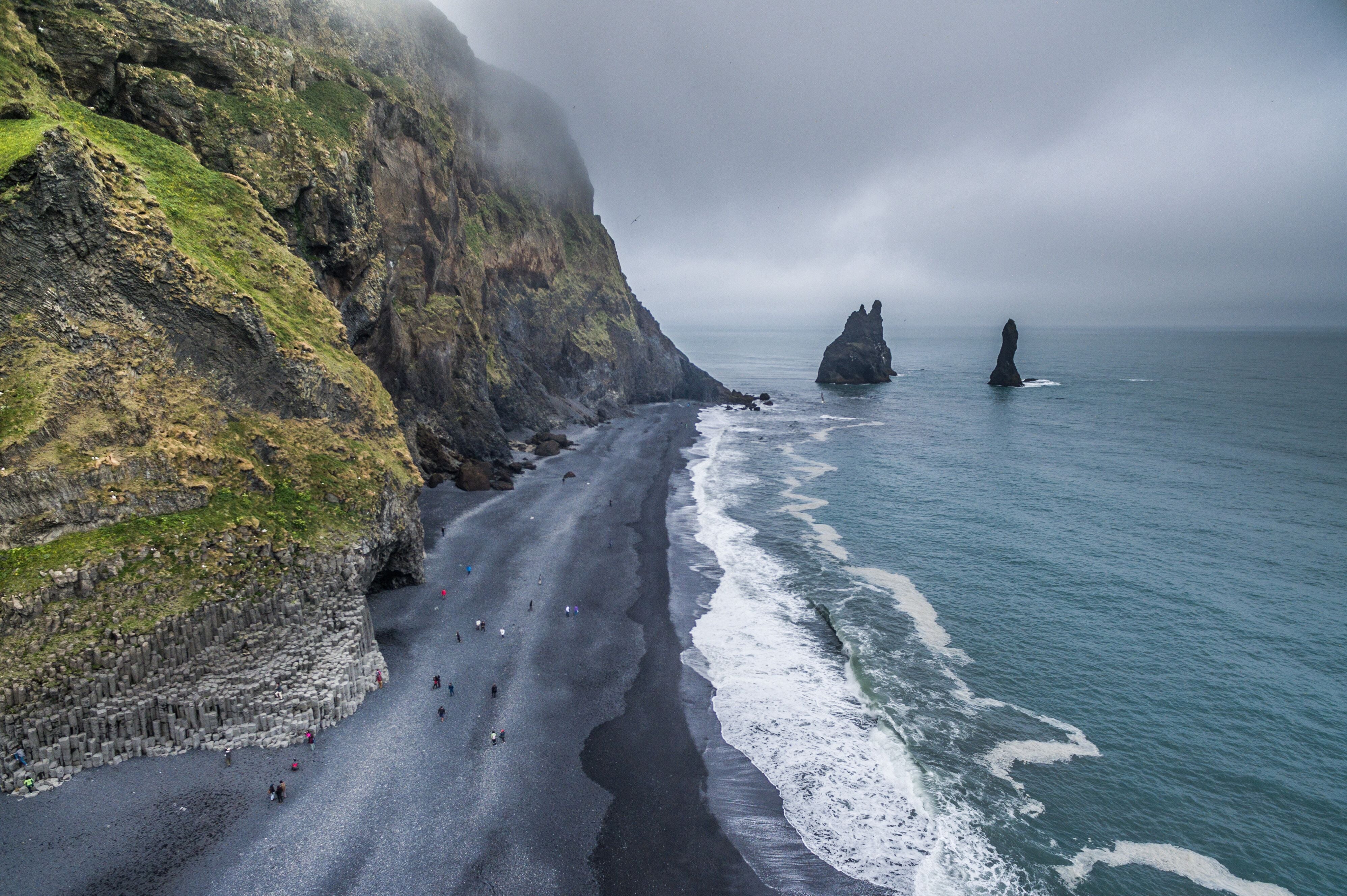 The South Coast boasts long stretches of black sands.