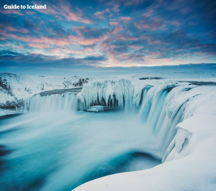 Snow covered waterfall in Iceland