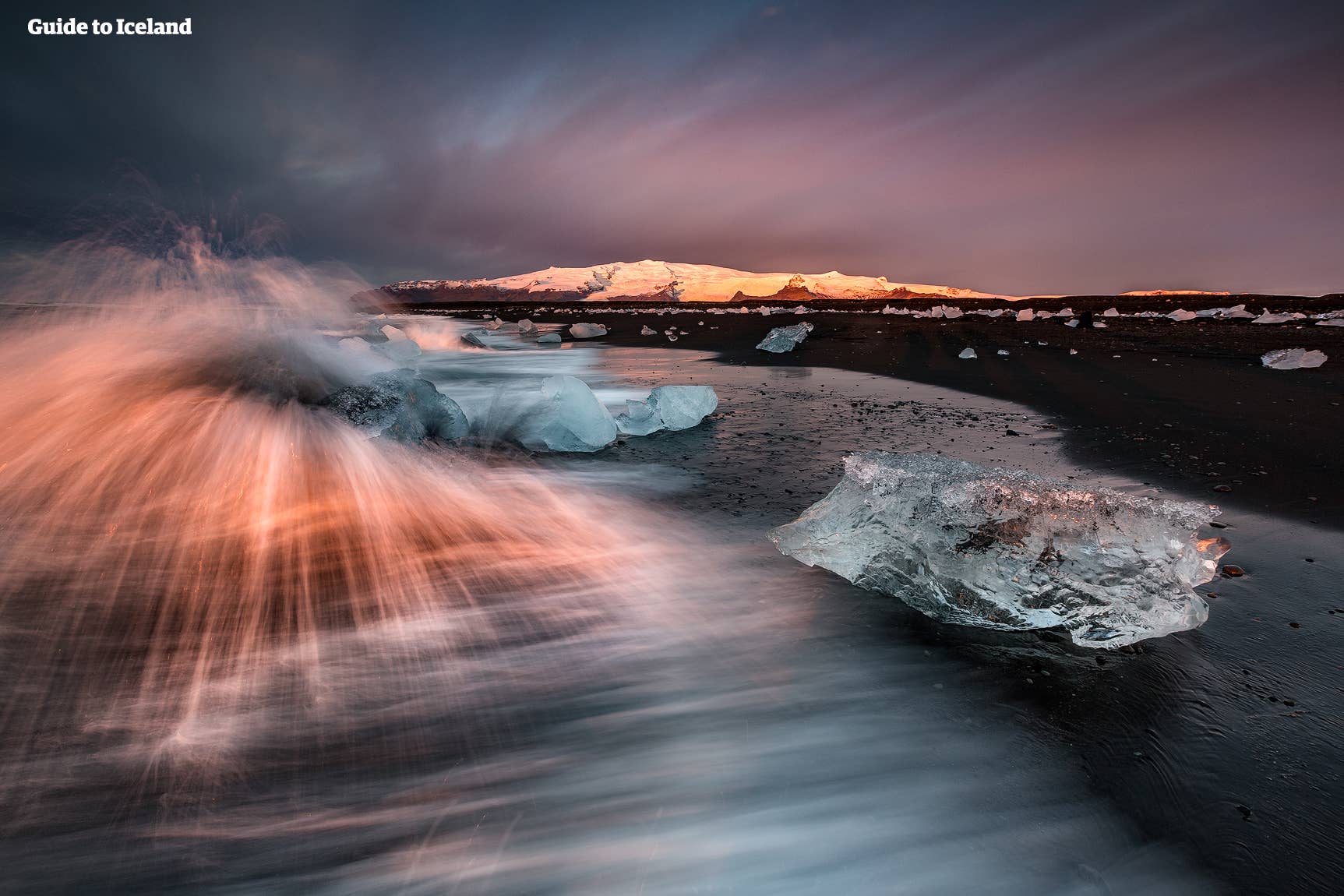A golden glacial view from the ice-filled Diamond Beach