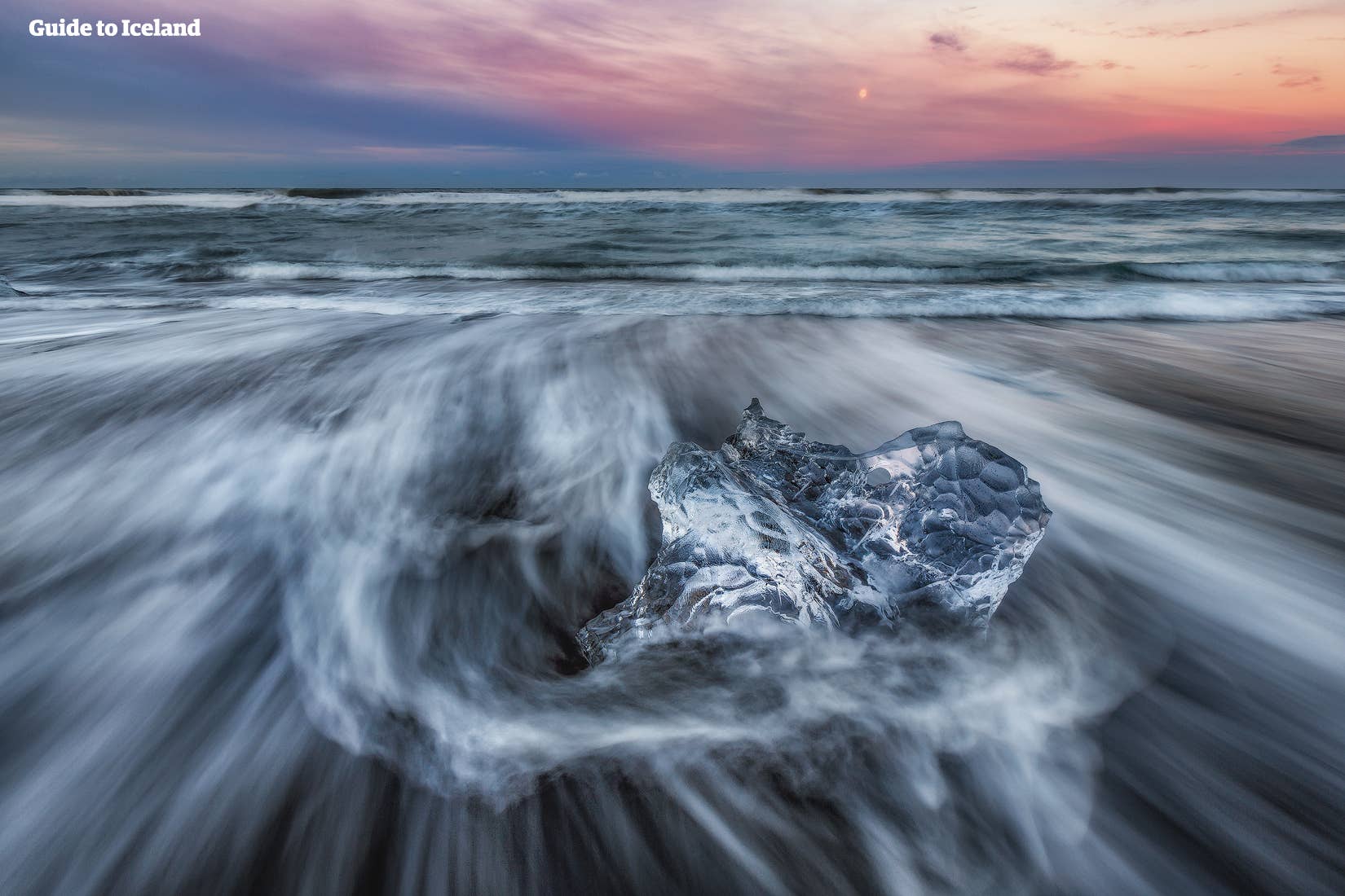 Sweeping waves at the Diamond Beach in the twilight