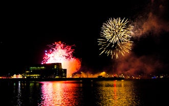 The Harpa Concert Hall as seen from the waters of Faxaflói Bay in Reykjavík at year's end.