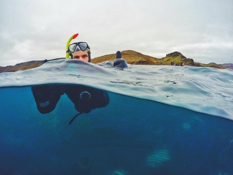 Snorkeling in Kleifarvatn lake, Iceland