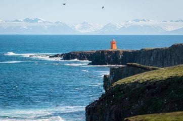 grimsey island north Iceland orange lighthouse ocean mountains shutterstock.jpg