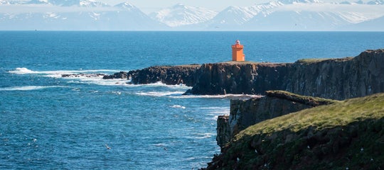 grimsey island north Iceland orange lighthouse ocean mountains shutterstock.jpg