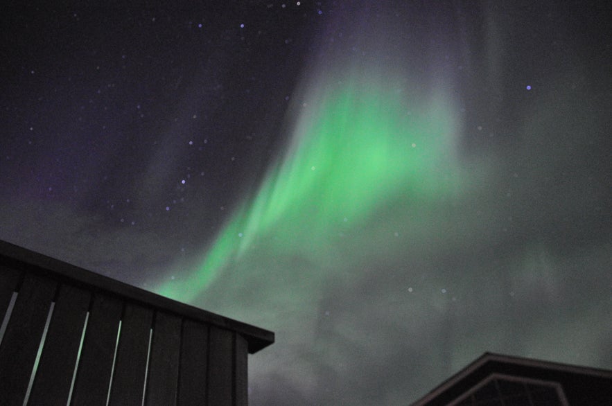 Auroras over Lamb-inn guesthouse by Akureyri