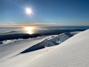 The snowy peak of Hvannadalshnukur boasts panoramic views of South Iceland and beyond.