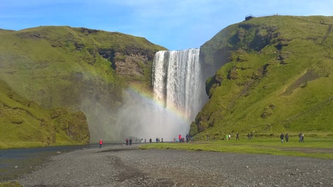 Skógafoss in South Iceland is known for its size, power, and rainbows in summer.