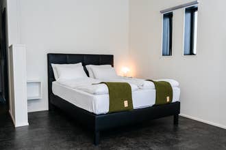 Couples will enjoy the comfortable beds in Stracta Hotel Mosfell.