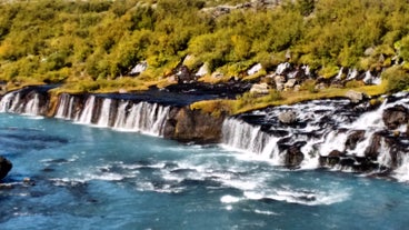 One of the most serene and picturesque waterfalls in west Iceland is Hraunfossar.