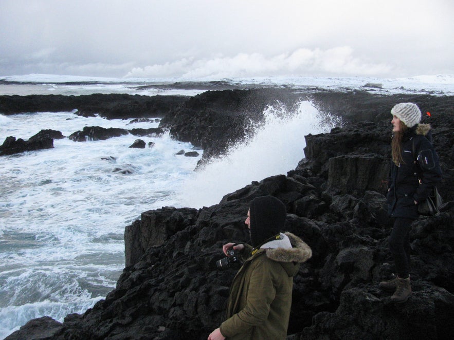 Regína and I watched from a safe distance, not quite as stable as we would have liked on the wet, uneven rock.