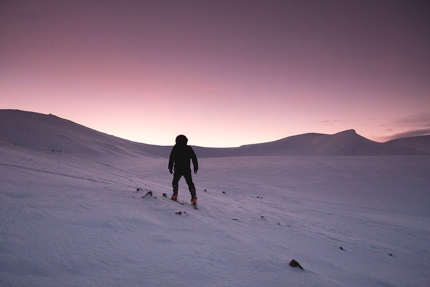 Skiing under the Northern Lights or dusk is a truly magical experience.