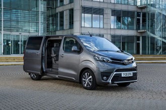 A minivan with its door open ready for a private tour in Iceland.