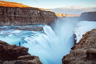 The Gullfoss waterfall looks stunning up close with its large volume of water.