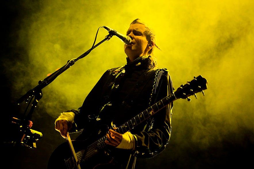 Using a cello bow against his guitar is something of a trademark for the band's lead vocalist.