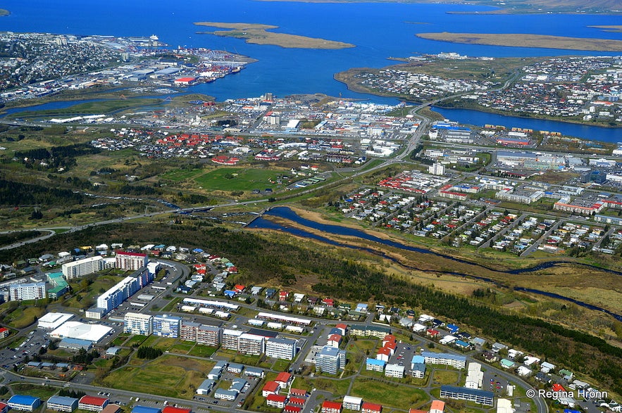 The view of suburbian Reykjavík from a helicopter