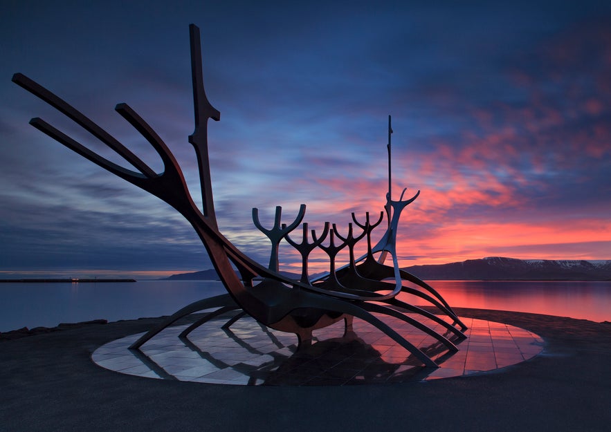 Sun Voyager sculpture in Reykjavik at sunset, overlooking the sea with colorful autumn sky in September