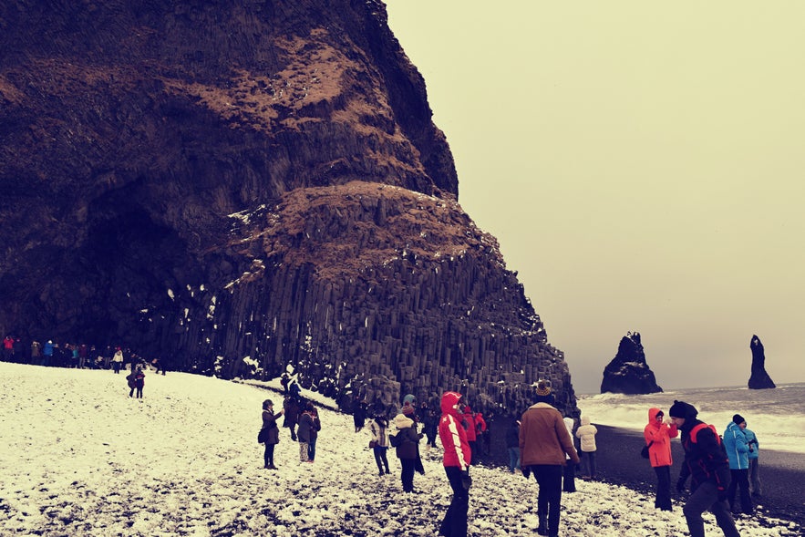 Tourists crowd Vik's Black Sand Beach