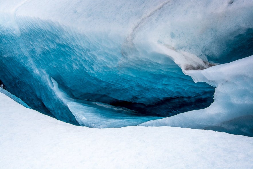 The ice becomes a vivid blue in winter