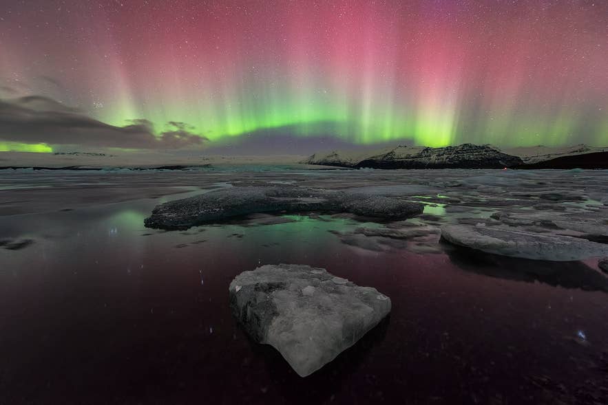 The northern lights in all their glory above the glacier lagoon