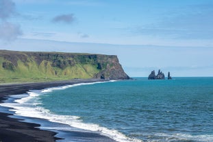 The South Coast of Iceland boasts stretches of black sand beaches.